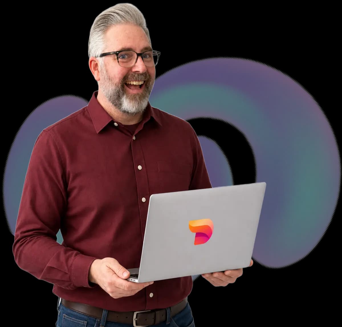 Jeremy Kenerson of DeskTeam360 holding a laptop ready to discuss strategy